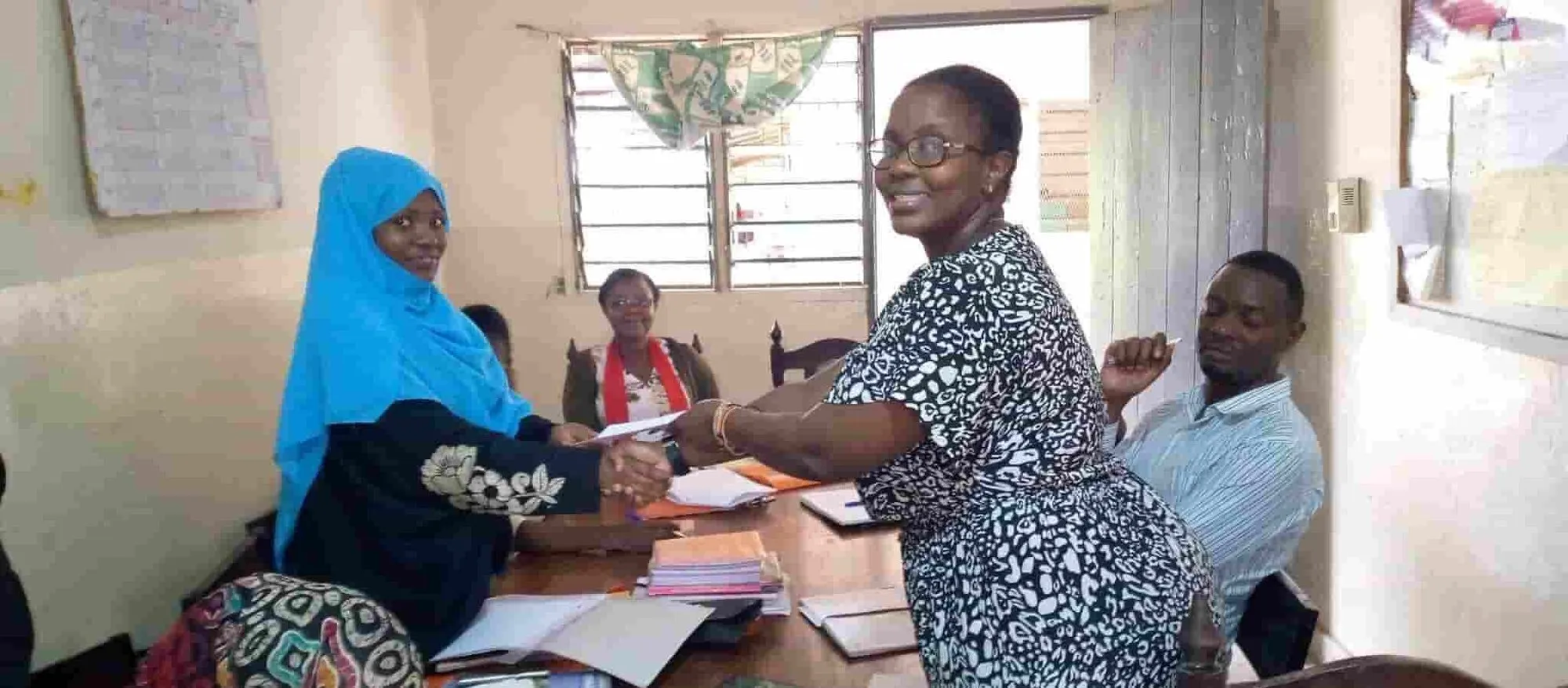 Teacher receiving an award